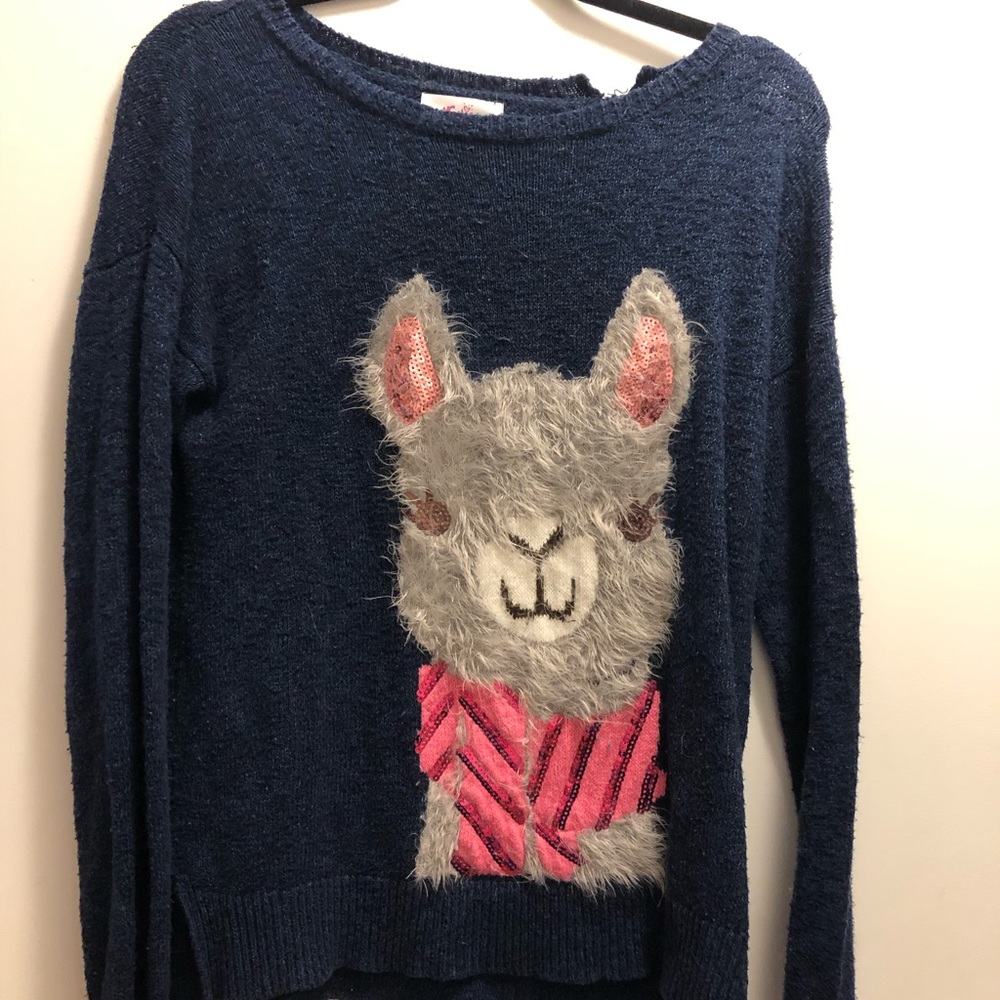 Justice llama sweater.